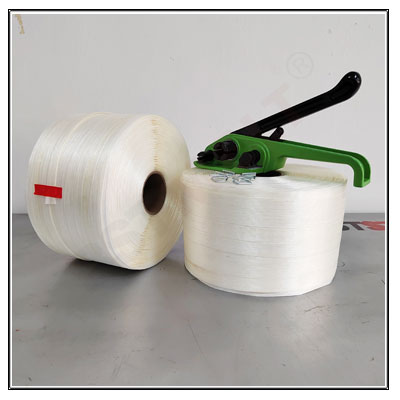 Bale press strapping